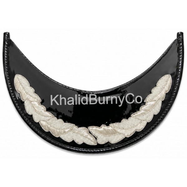 black patent leather cap visor features hand-embroidered silver bullion wire